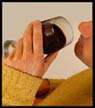 Man sipping red wine